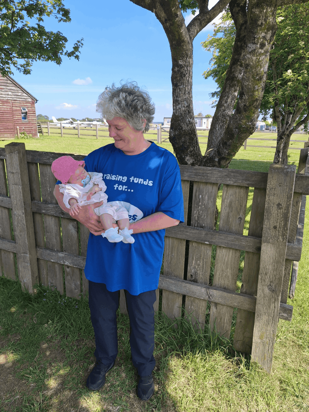 Alicia being held by her Grandmother Theresa