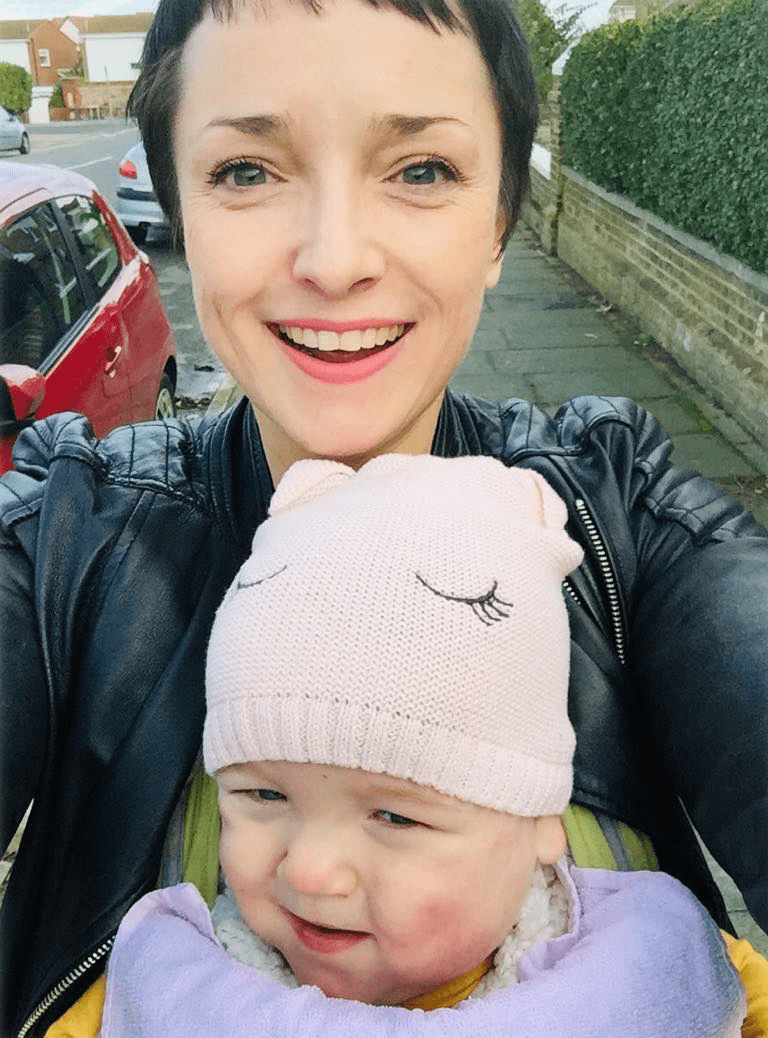 Baby Annabelle with her mum in a carrier