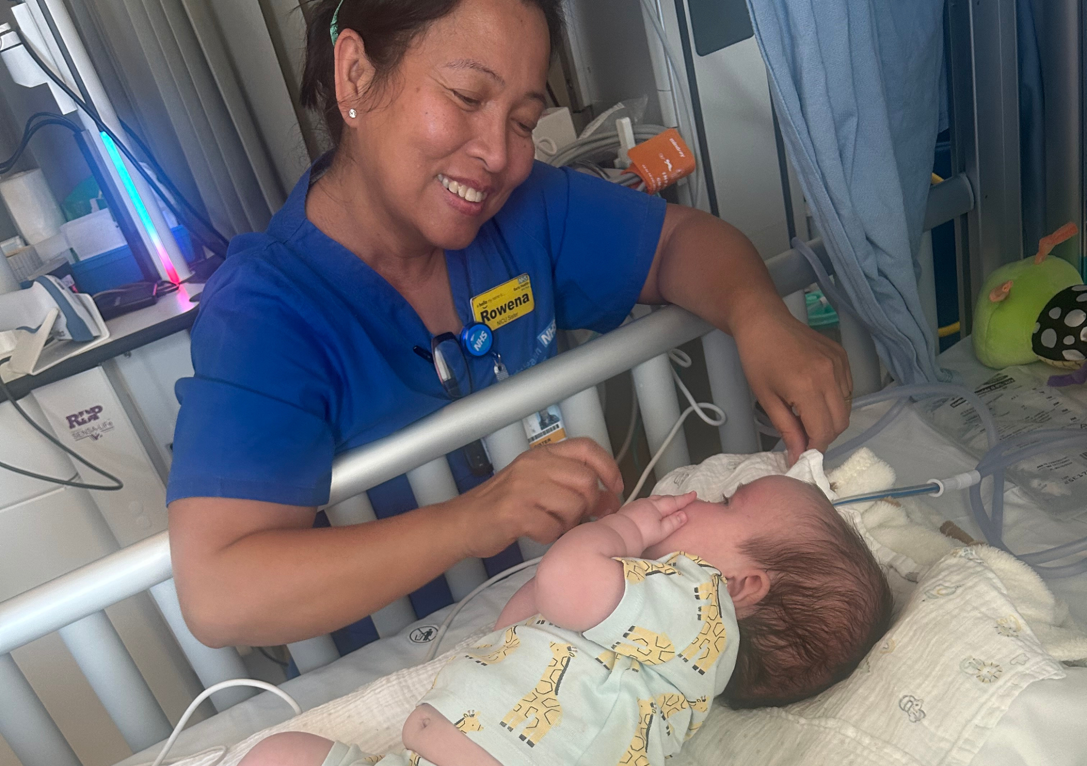 Neonatal nurse Rowena with baby Freddie